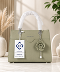 Elegant Structured Handbag with Floral Keychain